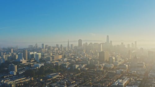 A view of Mumbai skyline covered in heavy smog and air pollution, illustrating the environmental challenges of unsustainable urban development and the urgent need for sustainable growth.